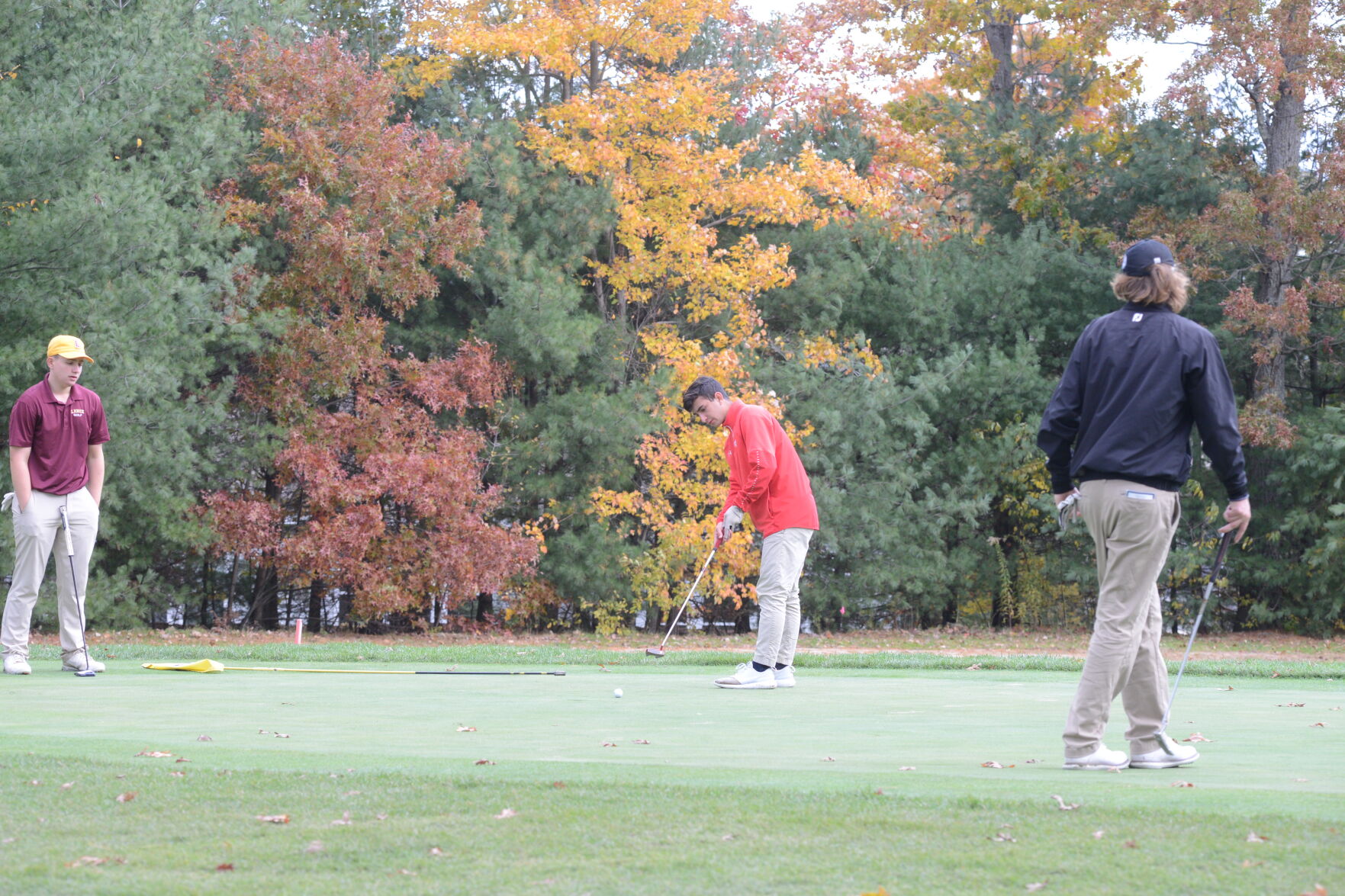 Cameron Turner takes a shot on 18